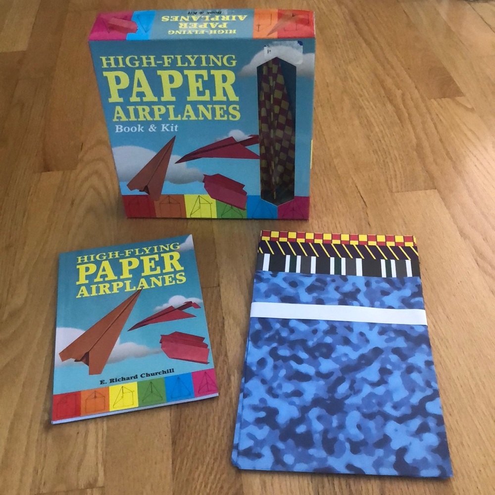 High-flying paper airplanes kit contains 59 sheets